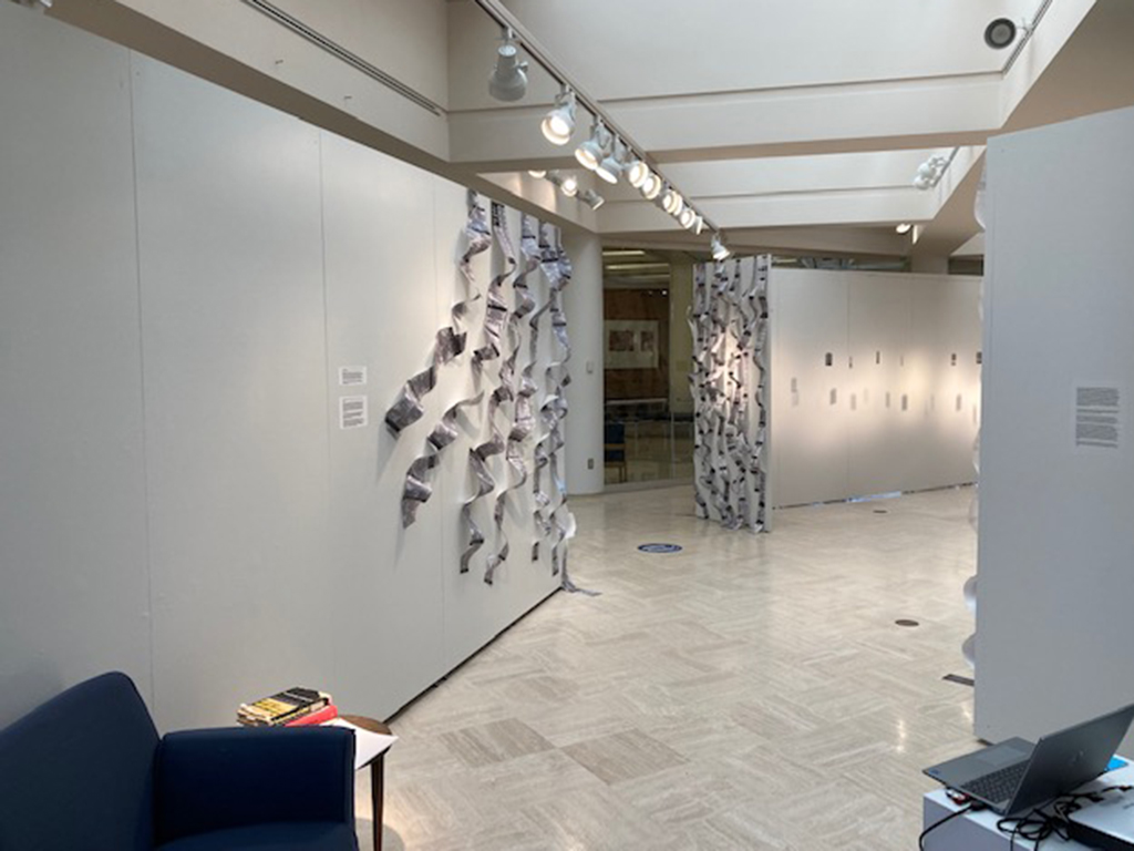 back side of desk wall with letter and reading area shown